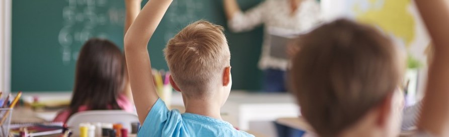 kids-raising-hands-classroom-school-engagement